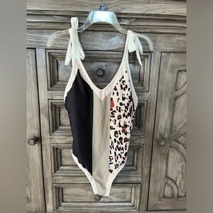Stylish Women's One Piece Swimsuit - Black, Cream, and Leopard Print